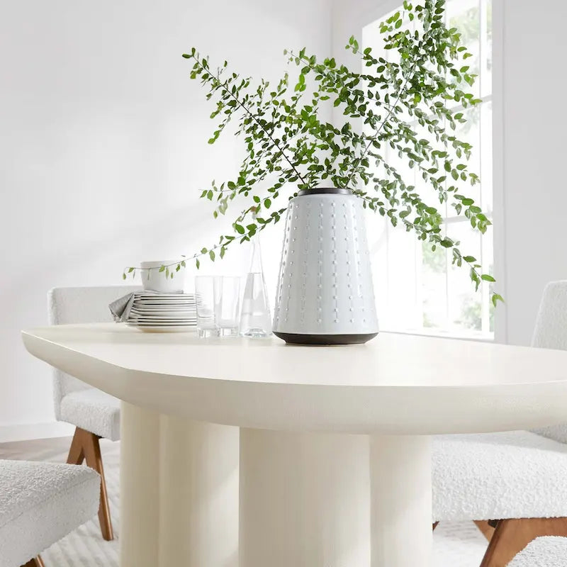 Table à manger ovale de 72 po avec finition aspect béton et base à double piédestal